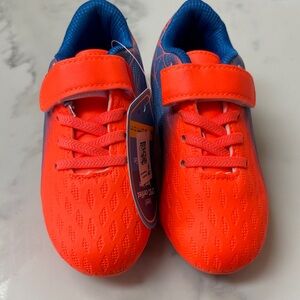 Kids Neon Orange Soccer cleats with Blue Interior